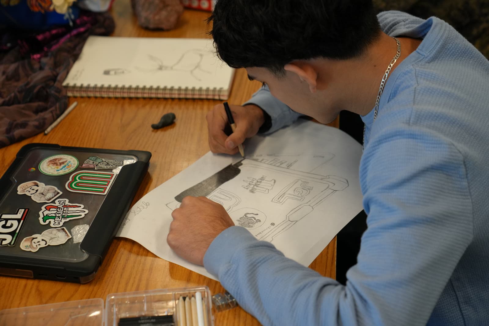 A Madison Highland Prep student sketching in art class